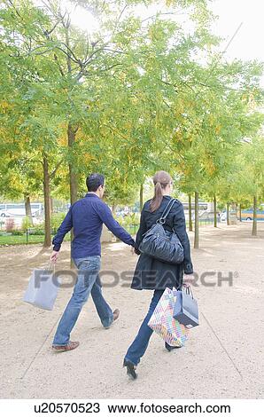 Couple shopping in Paris View Large Photo Image Stock Image - Couple shopping in Paris. Fotosearch
