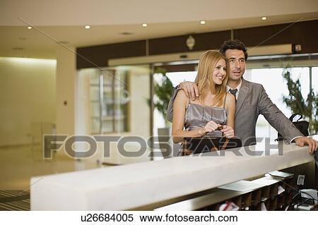 Couple standing on reception View Large Photo Image Stock Photography - Couple standing on reception. Fotosearch