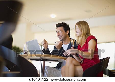 Couple with laptop View Large Photo Image Stock Image - Couple with laptop. Fotosearch