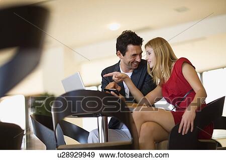 Stock Photo - Couple with laptop. Fotosearch
