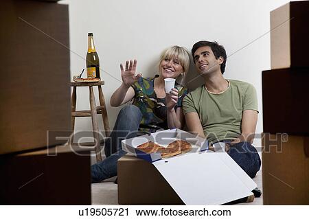 Couples first night in new apartment View Large Photo Image Stock Image - Couples first night in new apartment. Fotosearch