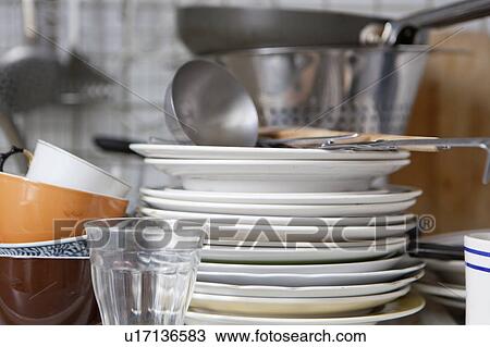 Stock Image - Dishes in a kitchen. Fotosearch