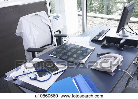 Doctor's desk, x-rays & stethoscope View Large Photo Image Stock Image - Doctor's desk, x-rays & stethoscope. Fotosearch