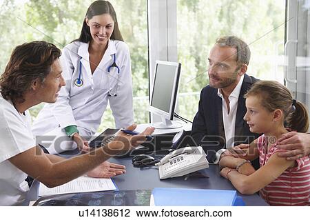 Doctors with patients, in office View Large Photo Image Stock Image - Doctors with patients, in office. Fotosearch