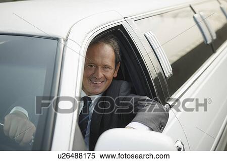 Driver in limousine View Large Photo Image Stock Photography - Driver in limousine. Fotosearch