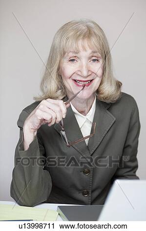 Stock Image - Elder business woman. Fotosearch