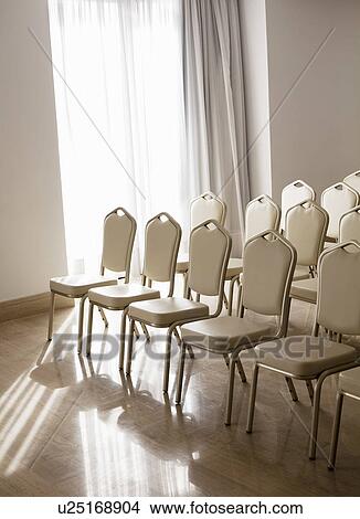 Empty chairs in empty room View Large Photo Image Picture - Empty chairs in empty room. Fotosearch