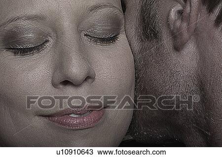 Face of a woman close to a man View Large Photo Image Stock Image - Face of a woman close to a man. Fotosearch