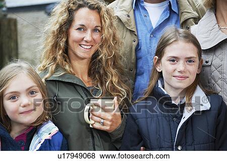 Family drinking tea on the farm View Large Photo Image Stock Photo - Family drinking tea on the farm. Fotosearch