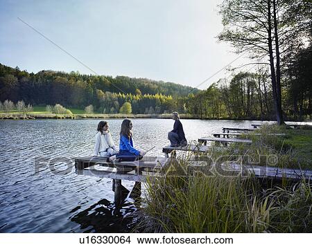 Picture - Family enjoying autumnal atmosphere. Fotosearch