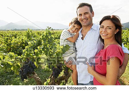 Family in a vineyard View Large Photo Image Stock Image - Family in a vineyard. Fotosearch