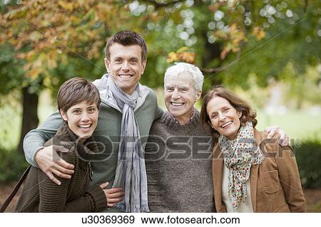 Family in the park View Large Photo Image Stock Photo - Family in the park. Fotosearch