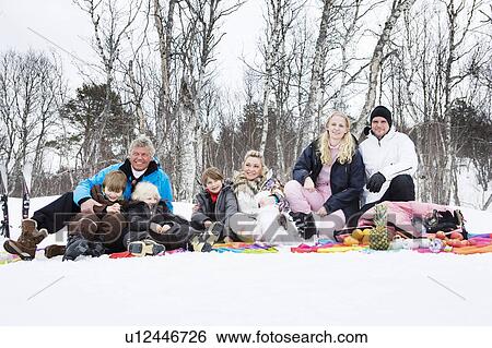 Stock Photograph - Family portrait in snow. Fotosearch