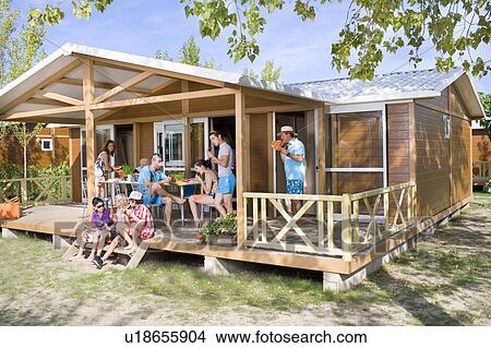 Picture - Family summer watermelon meal vacation. Fotosearch