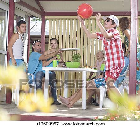 Family vacation picnic on terrace View Large Photo Image Stock Photo - Family vacation picnic on terrace. Fotosearch