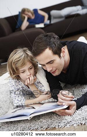 Father and daughter reading View Large Photo Image Stock Image - Father and daughter reading. Fotosearch