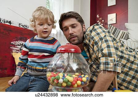 Father and son playing View Large Photo Image Stock Photo - Father and son playing. Fotosearch