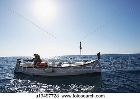 Fisherman on fishing boat at sea View Large Photo Image Stock Photo - Fisherman on fishing boat at sea. Fotosearch