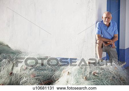 Fisherman with nets View Large Photo Image Stock Image - Fisherman with nets. Fotosearch