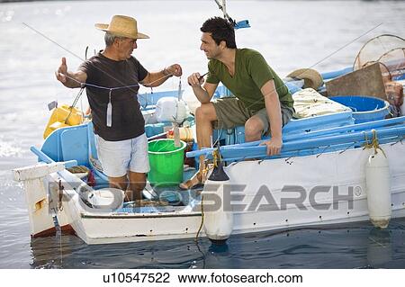 Fishermen on boat View Large Photo Image Stock Image - Fishermen on boat. Fotosearch