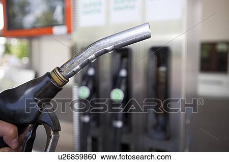 Gas pump nozzle View Large Photo Image Stock Image - Gas pump nozzle. Fotosearch