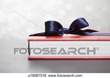 Stock Photo - Gift wrapped book. Fotosearch