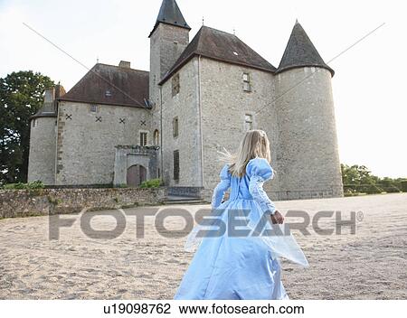 Girl as a princess infront of castle View Large Photo Image Stock Image - Girl as a princess infront of castle. Fotosearch