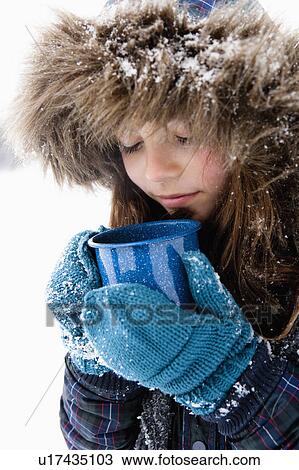 Girl holding cup of tea View Large Photo Image Stock Image - Girl holding cup of tea. Fotosearch