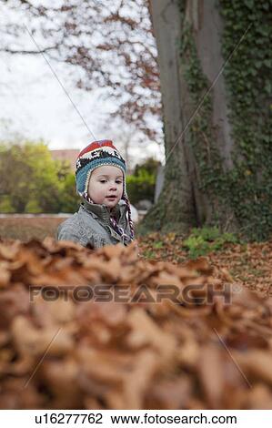 Stock Image - Girl in garden. Fotosearch