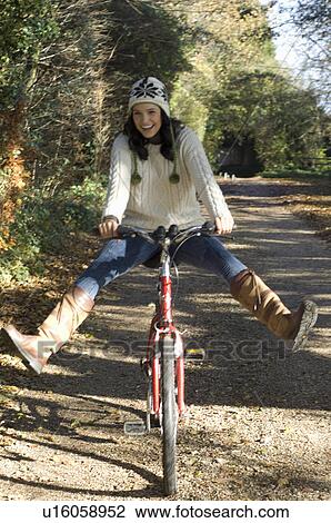 Girl on bike View Large Photo Image Stock Image - Girl on bike. Fotosearch