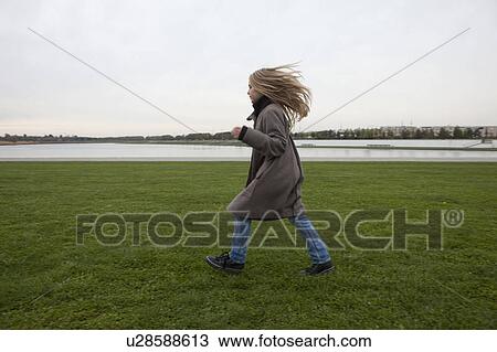 Girl running in park View Large Photo Image Stock Image - Girl running in park. Fotosearch