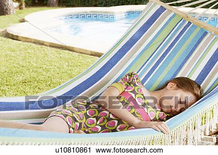 Girl sleeping in hammock View Large Photo Image Stock Image - Girl sleeping in hammock. Fotosearch
