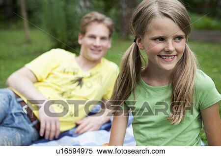 Girl with her older brother View Large Photo Image Stock Photography - Girl with her older brother. Fotosearch