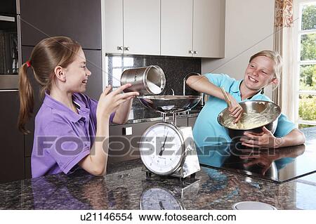 Picture - Girls cooking in the kitchen. Fotosearch
