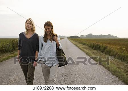 Girls on the road View Large Photo Image Stock Photo - Girls on the road. Fotosearch