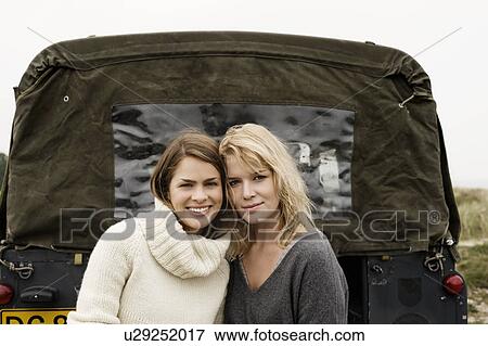 Girls posing for camera View Large Photo Image Stock Photo - Girls posing for camera. Fotosearch