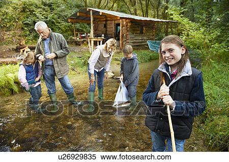 Grandparents and grandchildren exploring View Large Photo Image Stock Photography - Grandparents and grandchildren exploring. Fotosearch