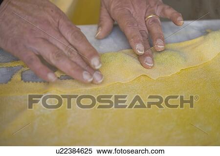 Hands forming pasta dough View Large Photo Image Stock Photography - Hands forming pasta dough. Fotosearch