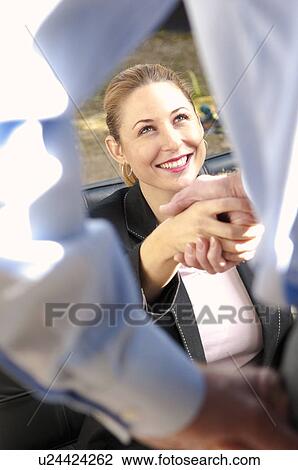 Happy business woman meets colleague View Large Photo Image Stock Image - Happy business woman meets colleague. Fotosearch