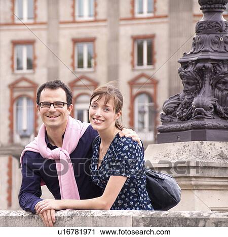 Happy couple on Paris bridge View Large Photo Image Stock Image - Happy couple on Paris bridge. Fotosearch