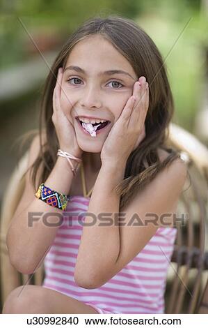 Stock Image - Happy Girl. Fotosearch