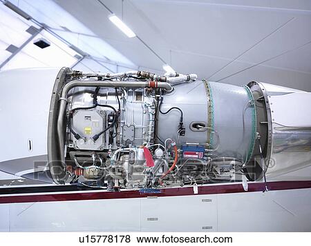Jet engine in an aircraft hangar View Large Photo Image Stock Photo - Jet engine in an aircraft hangar. Fotosearch