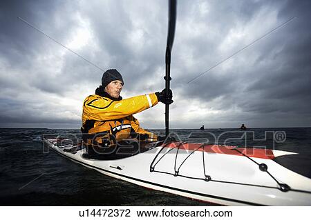Kayaker at see View Large Photo Image Stock Image - Kayaker at see. Fotosearch