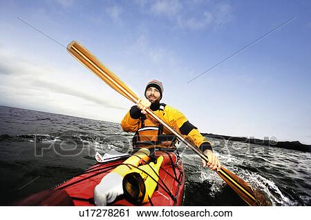 Stock Image - Kayaker on see. Fotosearch