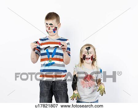 Kids playing with finger paint View Large Photo Image Stock Photo - Kids playing with finger paint. Fotosearch