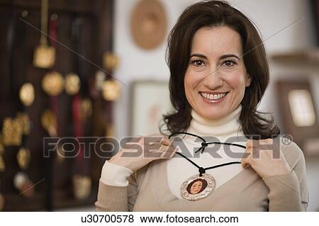Lady with necklace View Large Photo Image Stock Photo - Lady with necklace. Fotosearch