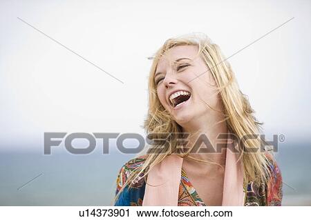 Stock Image - Laughing woman. Fotosearch