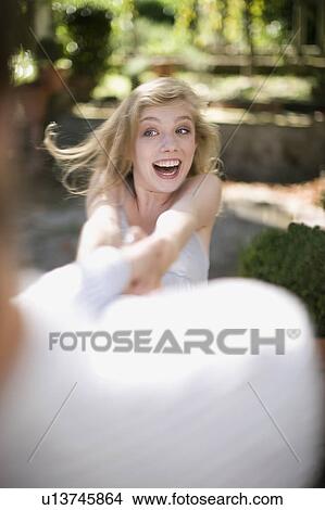Laughing young woman View Large Photo Image Picture - Laughing young woman. Fotosearch