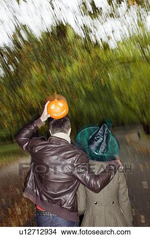 Man and woman going to halloween party View Large Photo Image Picture - Man and woman going to halloween party. Fotosearch