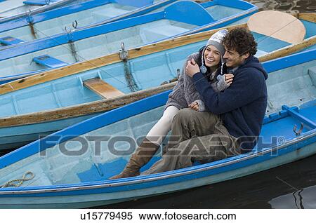Man and woman in row boat View Large Photo Image Stock Photography - Man and woman in row boat. Fotosearch